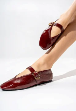 Courtney Buckle Patent Flat