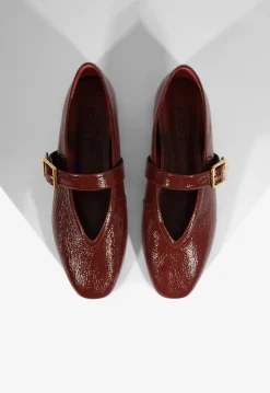 Courtney Buckle Patent Flat